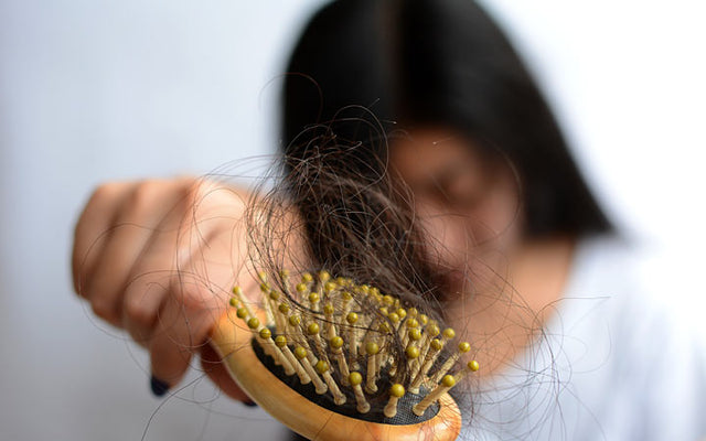 How Much Hair Fall Per Day Is Normal? Should You Be Worrying?